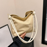 Yogodlns Seemisnahast k&auml;ekott vabaaja k&ouml;iega pandlaga disainiga mitmev&auml;rviline &otilde;lakott, reguleeritavad rihmad. 23x9x20cm