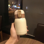 Paarid K&otilde;huga kruus, roostevabast terasest kaasaskantav naissoost &uuml;li&otilde;pilaste miniteetass 360 beež