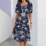 2023. aasta suve naiste kleidid Boheemlas stiilis retro vabaaja tr&uuml;kitud lillelised naiste elegantsed ja stiilsed l&uuml;hikeste varrukatega peokleidid XL