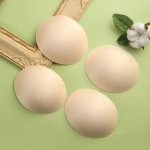 1paar seksikaid naiste rinnahoidjapadjakesi, eemaldatava polsterdusega rinnahoidja rindade suurendaja, push Up tassid ujumistrikoode bikiinide jaoks ihukarva