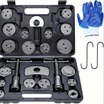 Pidurisadula tagasit&otilde;mbet&ouml;&ouml;riistade komplekt, pidurisadula kokkusurumist&ouml;&ouml;riistade komplekt koos t&otilde;ukepoltide komplektidega, kinnitusplaadid, pidurisadula riputid, 18 ketasadapterit must