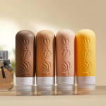 4 tk Reisipudelite Komplekt Hoiukotiga Reisisuuruses T&uuml;hjad Vedeliku Kreemi Losjooni Mahutid Peene Uduga Pihustuspudel