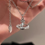 Saturni l&auml;bipaistev kaelakee h&otilde;bedane rangluu s&auml;rav teemant L&auml;&auml;ne Kuninganna Ema ni&scaron;&scaron; planeet