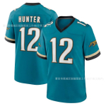 Jacksonville Jaguars NFL S&auml;rk Travis Hunter 12 V&otilde;rkmaterjal Hingav Tikitud Jalgpalli &Uuml;likond Meeste 12 Vintage Green