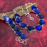 Sinise s&auml;hvatusega labradoriidi v&auml;&auml;riskiviehted, 925 prooviga t&auml;is h&otilde;bedast kaelakee ja k&auml;ev&otilde;ru ehtekomplekt, h&auml;mmastavad k&auml;sitsi valmistatud looduslikud ehted naisele Adjustable With 8"-18" sinine