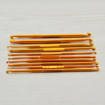 10 tk alumiiniumoksiidist heegeln&otilde;ela komplekt isetehtud kudumisvardad koduseks kudumis&otilde;mblust&ouml;&ouml;riistad kuld