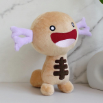 Wooper Paldea Pl&uuml;&uuml;s on pl&uuml;&uuml;sist m&auml;nguasi m&auml;ngus Pokemon pruun
