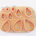 10 tk vesipiisa kujuga k&uuml;psisel&otilde;ikuri komplekt kondiitritoodete k&uuml;psetusvorm Pol&uuml;meerist savist l&otilde;ikurid koogil&otilde;ikuri vorm 10pcs