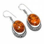 L&auml;&auml;nemere merevaigust v&auml;&auml;riskivi k&auml;sitsi valmistatud 925 sterlingh&otilde;be ehted k&otilde;rvar&otilde;ngas 1.50 1.5 oranž