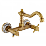 Kahe auguga kahe hoovaga p&ouml;&ouml;ratav segistikraan Kuum/k&uuml;lm vee segamisventiil Kraanid Retro Valamu Messingist Valamukraanid Vannituppa K&ouml;&ouml;ki