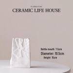 Luksuslik valge keraamiline vaas elutoa ja magamistoa kaunistamiseks, millel on origamist inspireeritud disain ja tipptasemel detailid. Origami Bottle