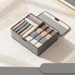 Kokkupandav sahtel Korraldaja Riidekarp T-s&auml;rk Teksad Retuusid Kapp Hoiukast 13 grids hall