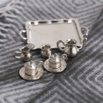 10 tk 1/12 nukumaja miniatuurne h&otilde;bedane metallist tee-kohvialuse lauan&otilde;ude komplekt