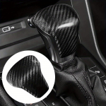 1 tk Volkswagen Tiguani 2017-2021 ABS-i s&uuml;sinikkiust auto salongi k&auml;iguvahetusnupu katte trimmi kleebis must