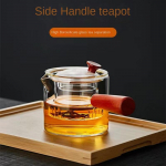 K&uuml;lgmise k&auml;epidemega klaasist teekann, paksendatud k&otilde;rge temperatuurikindel filter Puidust k&auml;epidemega teekann Puidust k&auml;epidemega klaasist kann teekomplekti jaoks