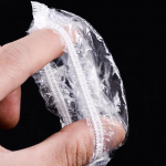 100 tk &uuml;hekordselt kasutatav juuksek&otilde;rvaklapp, l&auml;bipaistev elastne du&scaron;&scaron; juuksev&auml;rvi kaitset&ouml;&ouml;riist, veekindel k&otilde;rvakott, plastikust &uuml;mbris