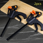 Kahe komplektiga Quick-Grip F-klambrid, millel on lihtne p&otilde;rkkinnitus &ndash; puidut&ouml;&ouml;tlemise ja isetegemise rasked k&auml;sit&ouml;&ouml;riistad &ndash; metallist ja plastist konstruktsioon ergonoomiliste k&auml;epidemetega