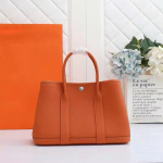 H home haute couture aiakott aiapidu kott suur mahutavus TOGO nahast t&ouml;&ouml;le k&auml;iv kott k&auml;ekott naistele 25cm oranž