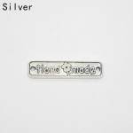 50 tk Vintage k&auml;sitsi valmistatud kirjariided metallist sildid Kaunistus DIY teppimine Naiste kotid Sildid Aksessuaarid Tarvikud