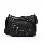 Naiste pehmest nahast mitme sahtliga mitme taskuga &otilde;mmeldud &uuml;he &otilde;laga k&auml;ekott