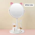 Kummuti edevuspeegel armsa kassi k&otilde;rvahoidjaga 360&deg; p&ouml;&ouml;ratava laua t&ouml;&ouml;pinna alusega, mida kasutatakse magamistoa kirjutuslaua kosmeetikapeeglite jaoks valge