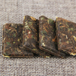 Liimjas l&otilde;hnav Pu-Erh k&uuml;ps tee esimese klassi v&auml;ike nelinurkne Pu-erh tee tellis 500g 500g