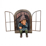 Mischievous garden gnome voyeur, funny garden tree decoration