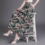 Naiste boheemlaslik lilleline A-l&otilde;ikeline puuvillase ja linase segu midi seelik M roheline/leht