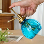 1 tk plastikust k&otilde;rvitsa kujuga mahlakas lillede kasvatamine Vintage vihmutuspott Aianduspress Aiapihusti Taimede kastekann sinine
