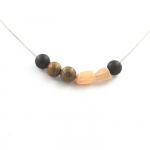 Pierres et Min&eacute;raux. Collier Pierre de soleil de Tanzanie + Perles Onyx noir mat + bois 8 Chaine en acier inoxydable.