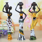 Eksootilised Aafrika tegelaskujudega vaigust valmistatud nukukaunistused &ndash; kolmest koosnev komplekt Resin Ornament