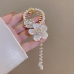 Kaelarihm Seotud kelluke Orhidee Tutt Juuksek&uuml;&uuml;ned Juuksekrabi Klamber hobusesabahoidja Juuksen&otilde;elad Juuste k&uuml;&uuml;niste aksessuaarid