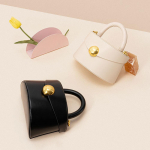 Esmaklassiline metallist k&auml;ekott, nahkkott beež