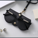 Kuum m&uuml;&uuml;k Kaasaskantavad r&otilde;huvastased prillid kotid prillide &uuml;mbrised p&auml;ikeseprillid hoiukott kaitsev kate prilli&uuml;mbris must