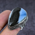 Looduslik Owyhee Opal kalliskivi k&auml;sitsi valmistatud 925 sterlingh&otilde;bedast ehtes&otilde;rmus S.7 H5W55