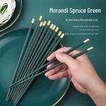 Luksuslikud Morandi tumerohelised libisemiskindlad portselanist s&ouml;&ouml;gipulgad kodus ja hotellis kasutamiseks, hallitusekindlad ja stiilsed sulamist k&auml;epidemed. 1.5cm gold alloy chopsticks