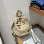 Versioon Pestaud Nailon Kerge Kaal Suure Mahutavusega Reisiseljakott Lihtne Kaasaskantav Kolledži &Uuml;li&otilde;pilase Koolikott 33 * 28 * 14CM