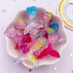 10 TK segavaigu s&auml;delev 3D kalasaba, lameda seljaga kivikujukesed, aplikatsioonid, merineitsi saba, v&auml;ljal&otilde;igete album, k&auml;sit&ouml;&ouml;, vibu kaunistused.