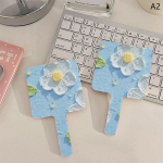 K&auml;eshoitav meigipeegel Kaasaskantavad v&auml;ikesed peegli ruudukujulised k&auml;epidemega peeglid Loova disainiga k&auml;eshoitav peegli reisitarbed