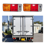 2&times; Tagumine kombineeritud tagatule komplekt pirnidega &ndash; Piduri / Stopp / Suunatuled &uuml;hilduv Mitsubishi Canter Fuso veokiga 24V punane/merevaigukollane