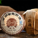 K&uuml;ps Pu'er tee Keedetud vana tee Yunnan Pu-erh tee Jinmao Gongi kook Pruuni puukook