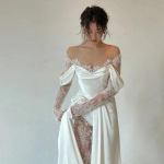 Elegantne valge O-kaelusega pitsiline pikkade varrukatega pulmakleit A-joon p&otilde;randapikkusega, rongi k&uuml;ljelt l&otilde;hikuga, satiinist t&otilde;mblukuga pruudikleit XL elevandiluuvalge