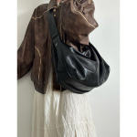 Suure mahutavusega must pelmeenikujuline kott retro- ja elegantse stiiliga, esitledes vabaaja &uuml;he&otilde;la Crossbody kotti. must