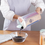 K&ouml;&ouml;k suletud s&auml;ilituskast teravilja jaotur Toidu s&auml;ilituspaak P&ouml;&ouml;rlev kuivtoidu tassid mahuti &uuml;mbris Jahu teraviljapurgid Korraldaja 4 grid-2000ml