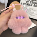 Armas t&otilde;eline saarma k&uuml;&uuml;likukarva j&auml;&auml;tis kohmakas auto v&otilde;tmehoidja ripats pl&uuml;&uuml;sist palliga raamat kott ripats kingitus beež