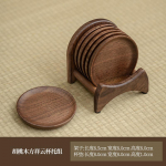 6-osaline puidust alusaluste komplekt, mustast p&auml;hklipuust lauamatid, &uuml;mmargune lauamatt, soojusisolatsiooniga padi, karp alumiseks hoidikuks, lauamattide riiul