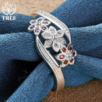 925 h&otilde;bedase lillega v&auml;rvilised AAA tsirkoonist s&otilde;rmuse ehted