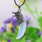 L&otilde;vi m&ouml;irgavas poolkuu roheline aventuriin sinine lapis lazuli valge kuukivi ripats kaelakee must k&ouml;is kett T&uuml;druku ehted