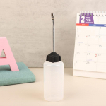 120 ml &otilde;mblusmasina &otilde;lipudel, l&auml;bipaistev valge plastikust pihustusotsik, t&uuml;hi &otilde;lipudeli &otilde;litaja, m&auml;&auml;rdeainete &otilde;lipudel, &otilde;li