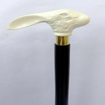 Kuninglik k&auml;sit&ouml;&ouml; messingist jalutuskepp, mis on valmistatud puidust K&uuml;&uuml;liku n&auml;ok&auml;epide Antiikne viktoriaanlik kepp valge must